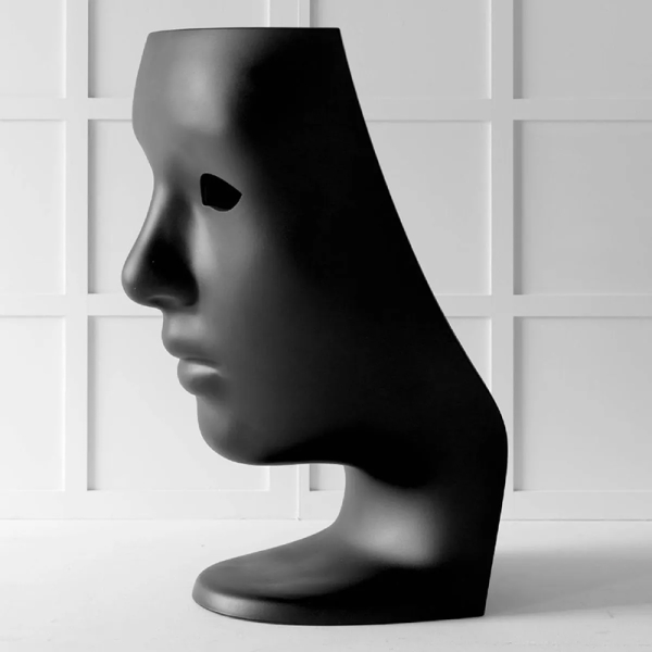 Le fauteuil contemporain et design NEMO pour une décoration d'artiste dans votre jardin 